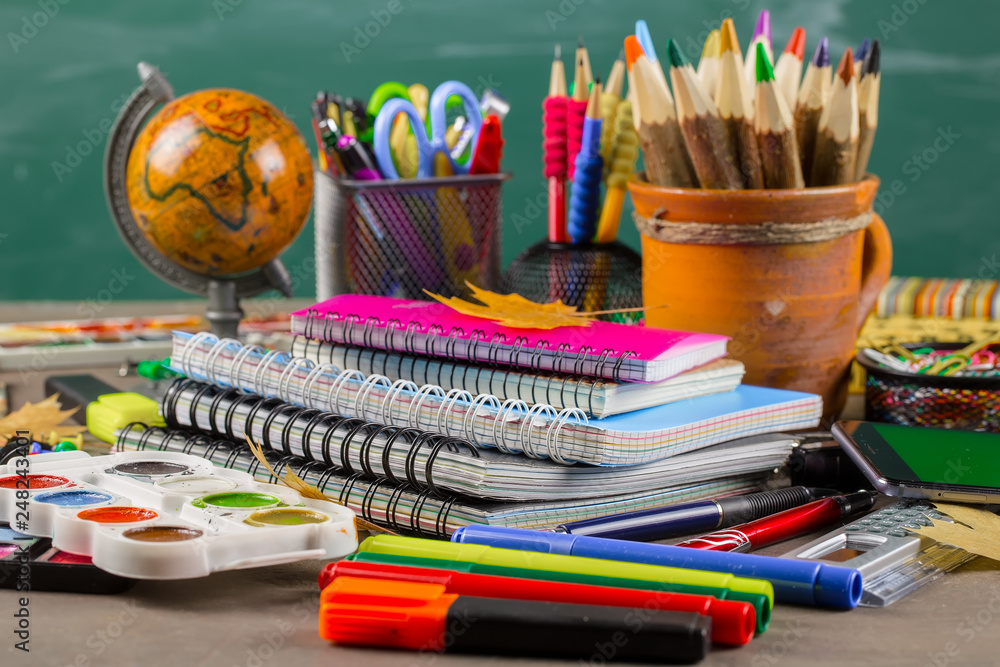 Obraz premium Back to school. Items for school classes in the composition on the table.