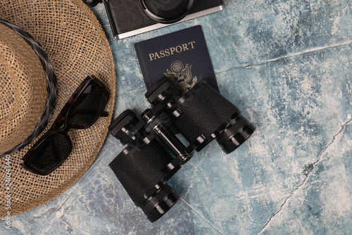 Canvas Print men's travel concept with one passport, sunglasses, masculine straw hat and came