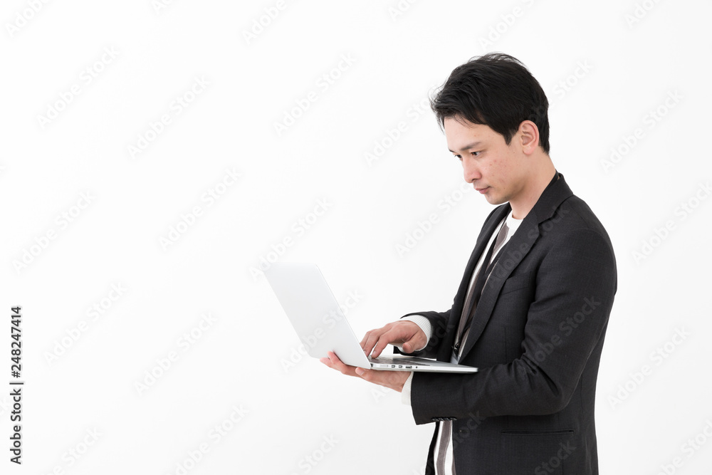 portrait of young asian man wearing suit isolated on white background portrait of young asian man wearing suit isolated on white background