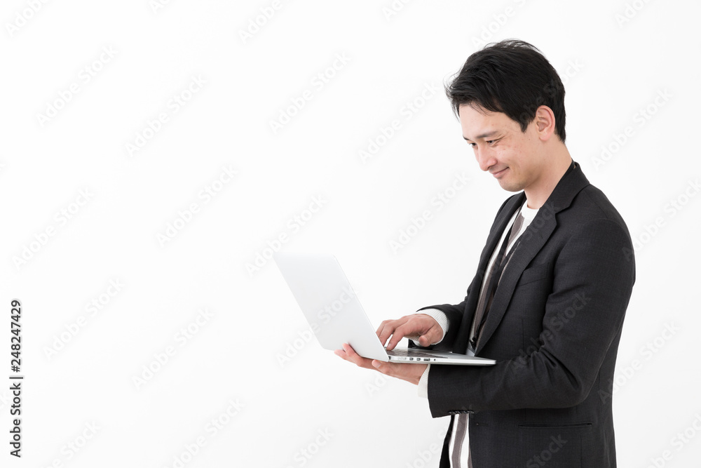 portrait of young asian man wearing suit isolated on white background portrait of young asian man wearing suit isolated on white background