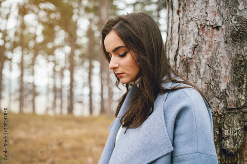 Portrait of young woman in the forest nature park