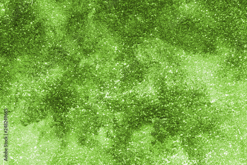 Watercolor green texture with abstract washes and brush strokes on the white paper background. Digital paper background.