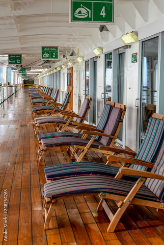 Deck chairs lined up on cruise ship