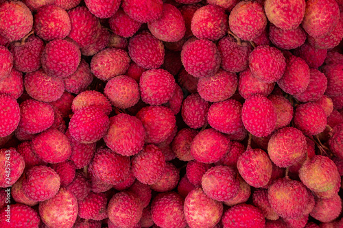 Fresh red lychee fruit background.