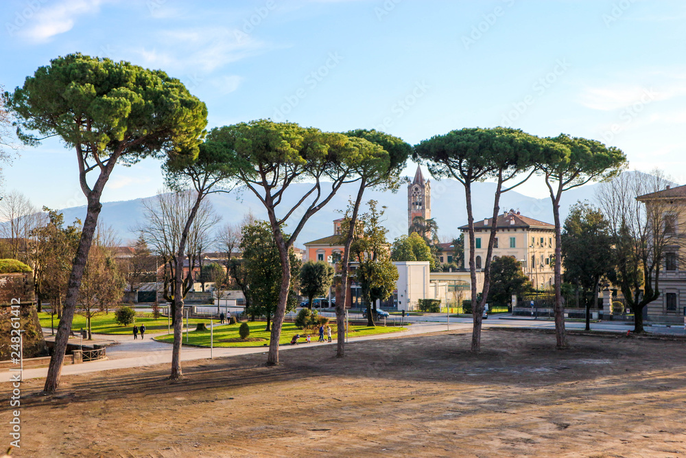 City park with mountains on the background in Lucca, Tuscany, Italy view from city wall City park with mountains on the background in Lucca, Tuscany, Italy view from city wall