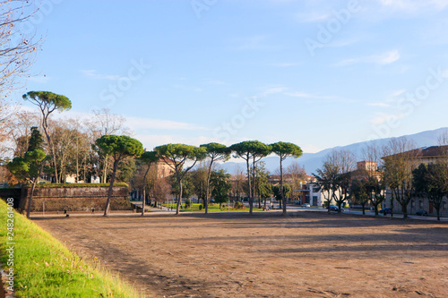 City park with mountains on the background in Lucca, Tuscany, Italy view from city wall