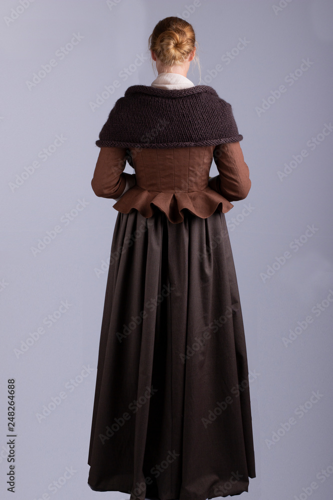 18th century woman in brown ensemble