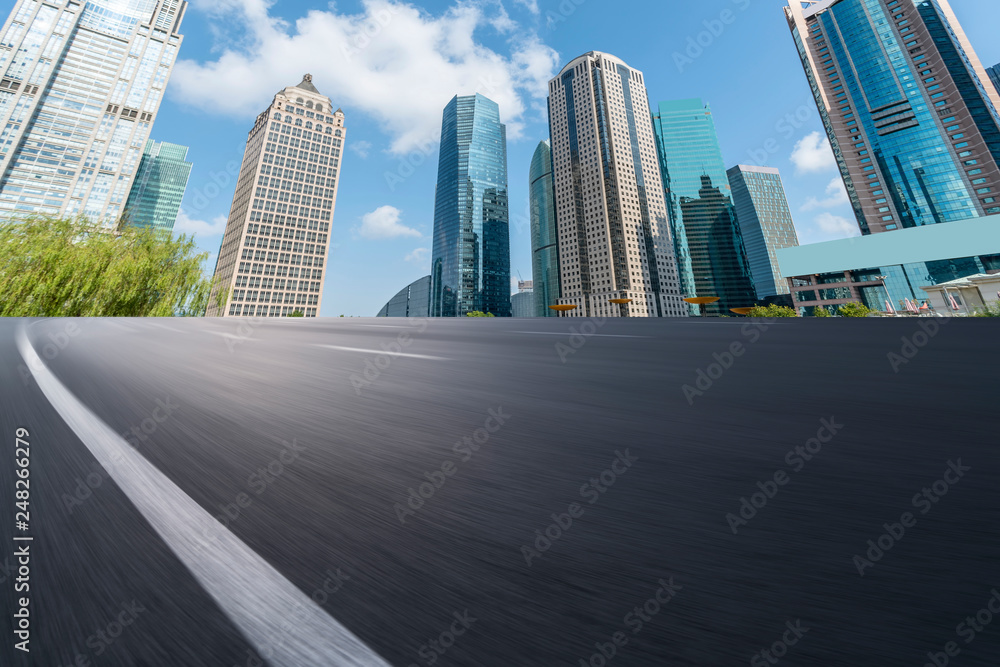 Fototapeta premium Highway Road and Skyline of Modern Urban Buildings in Shanghai..