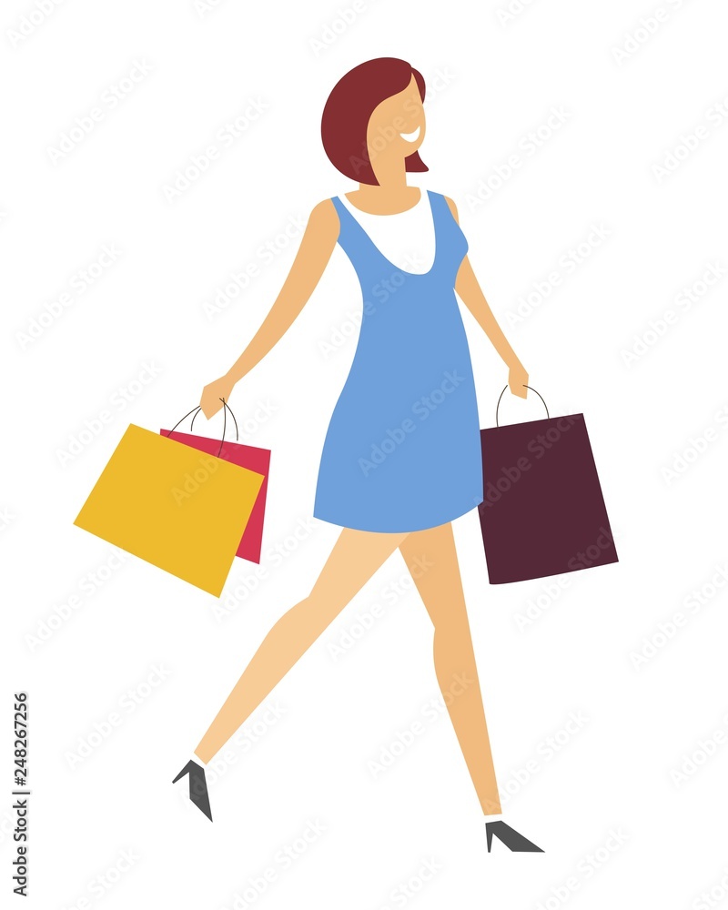 Woman with shopping bags walking in dress and stiletto shoes