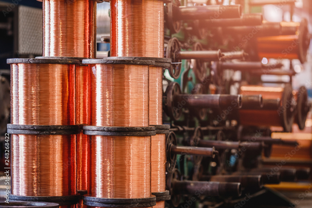 Production of copper wire, bronze cable in reels at factory Production of copper wire, bronze cable in reels at factory