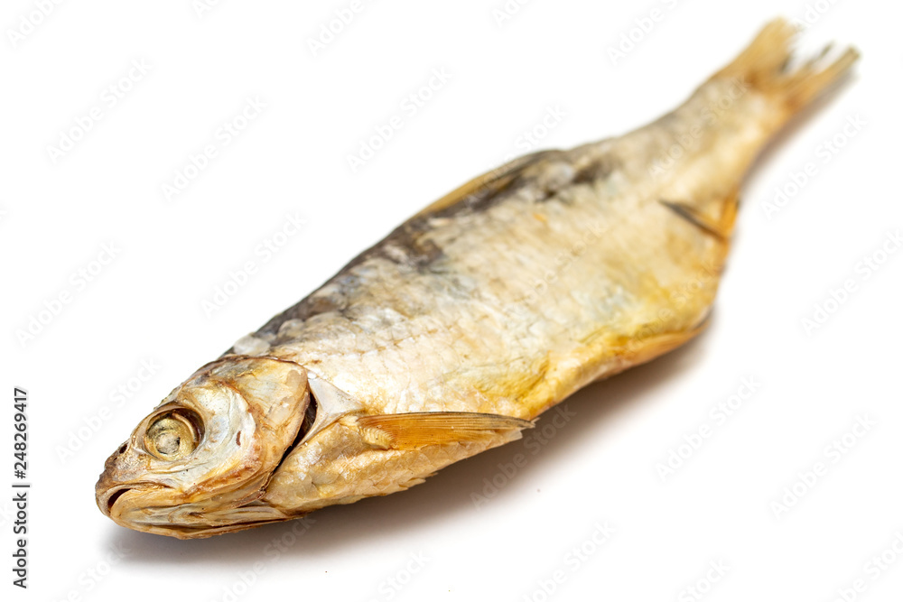Dry salted fish vobla isolated on white background, food for beer. Dry salted fish vobla isolated on white background, food for beer.