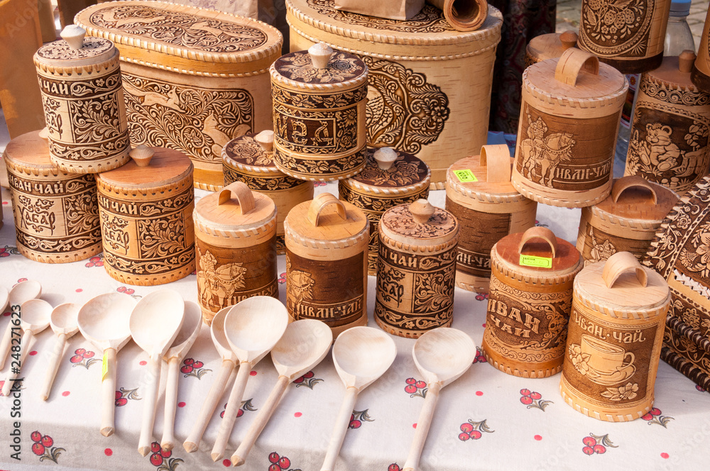 Russia, Khabarovsk, August 18, 2018: birch bark dishes and wooden spoons Russia, Khabarovsk, August 18, 2018: birch bark dishes and wooden spoons