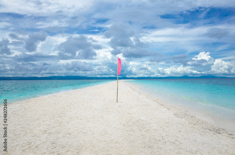 Pink flag on Kalanggaman Island Sand Bar - Leyte, Philippines Pink flag on Kalanggaman Island Sand Bar - Leyte, Philippines