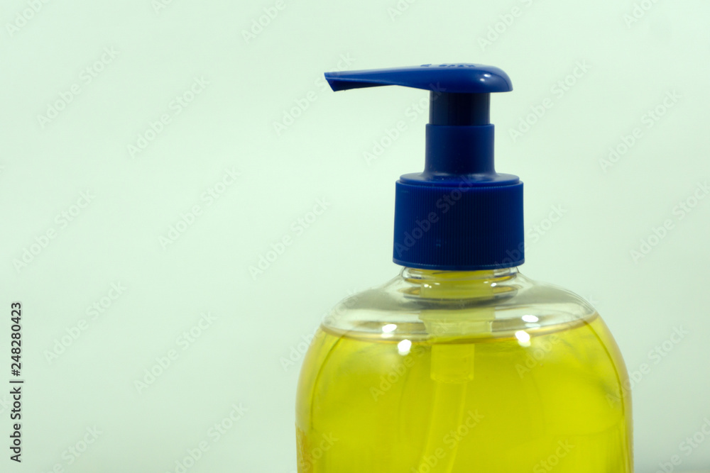 Set of different bottles for beauty, hygiene and health on a white background with reflection, they shampoo, conditioner and other hair products Set of different bottles for beauty, hygiene and health on a white background with reflection, they shampoo, conditioner and other hair products