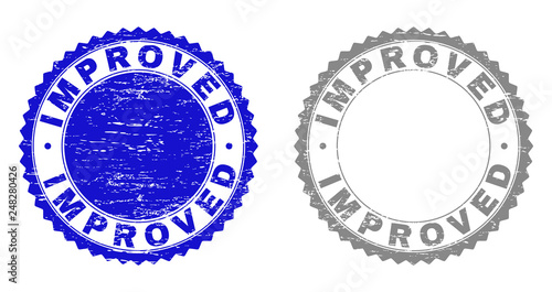 Grunge IMPROVED stamp seals isolated on a white background. Rosette seals with grunge texture in blue and gray colors. Vector rubber stamp imprint of IMPROVED text inside round rosette.