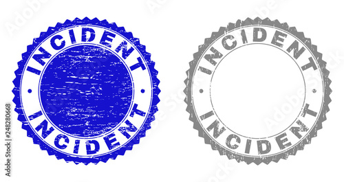 Grunge INCIDENT stamp seals isolated on a white background. Rosette seals with grunge texture in blue and grey colors. Vector rubber stamp imprint of INCIDENT label inside round rosette.