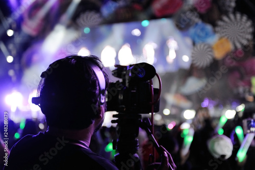 Cameraman recording concert event at night party concert,Recording with video camera © TheNumPhanu