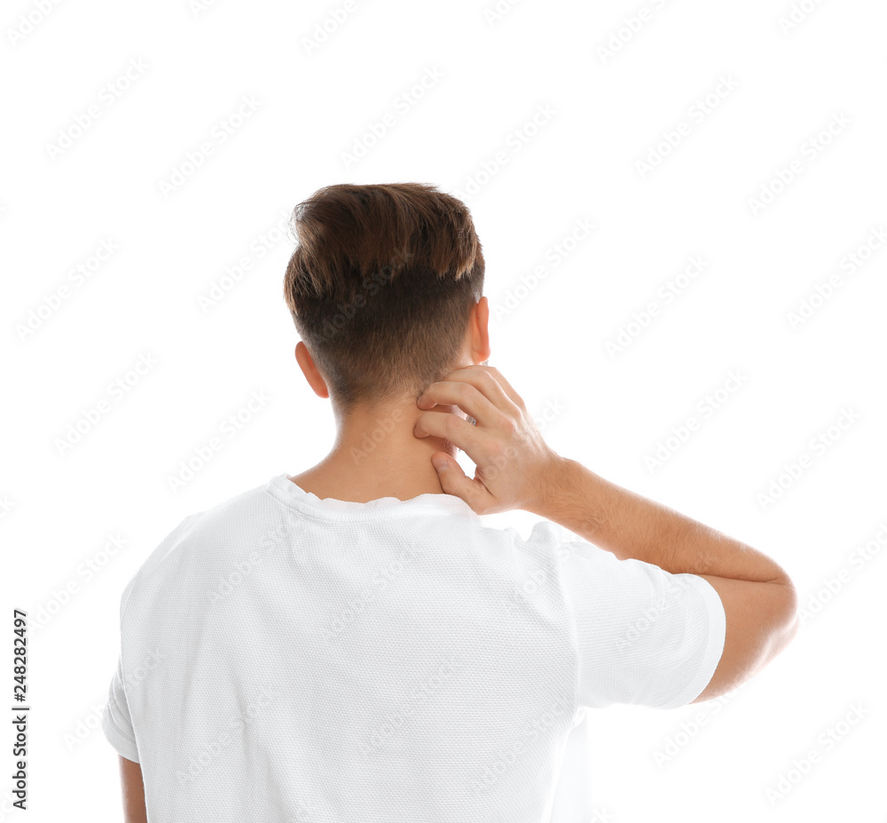Young man scratching neck on white background. Annoying itch Young man scratching neck on white background. Annoying itch
