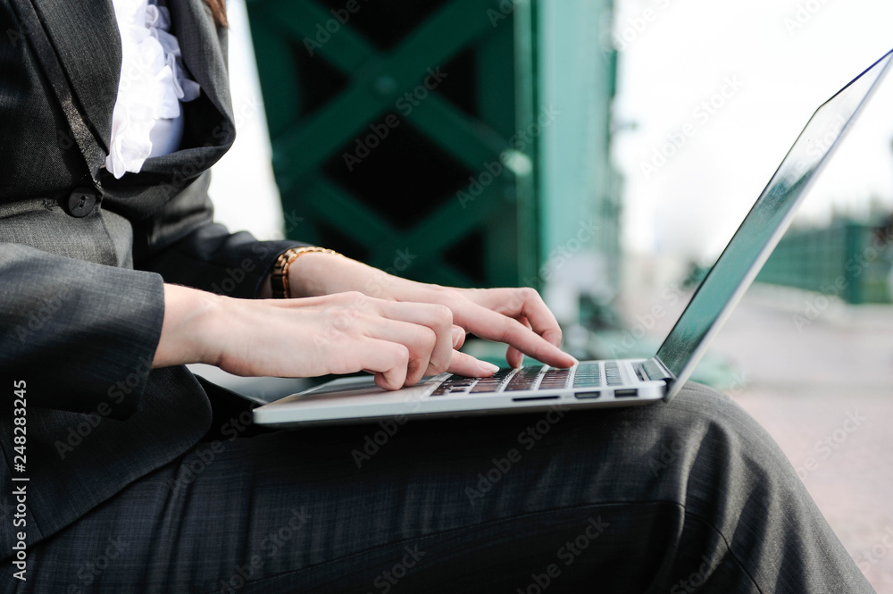 Business women using notbook,women using hand press computer keyboard,selective focus,Social network Business women using notbook,women using hand press computer keyboard,selective focus,Social network