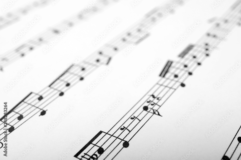 Sheet with music notes as background, closeup Sheet with music notes as background, closeup