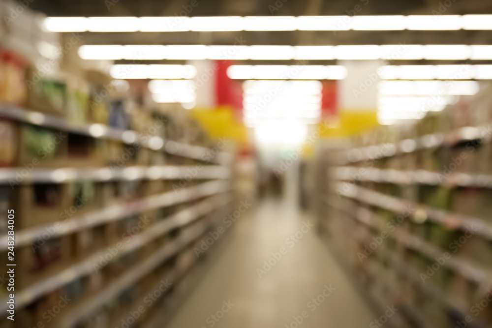 Blurred view of modern supermarket interior