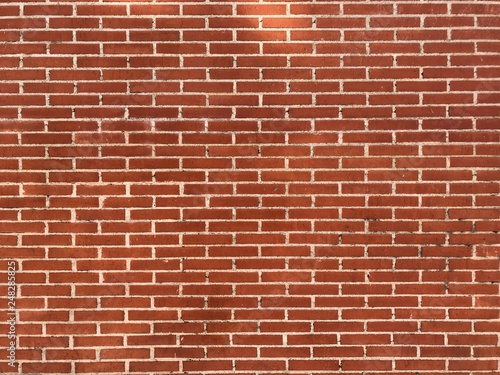 New red brick wall with white joints texture background