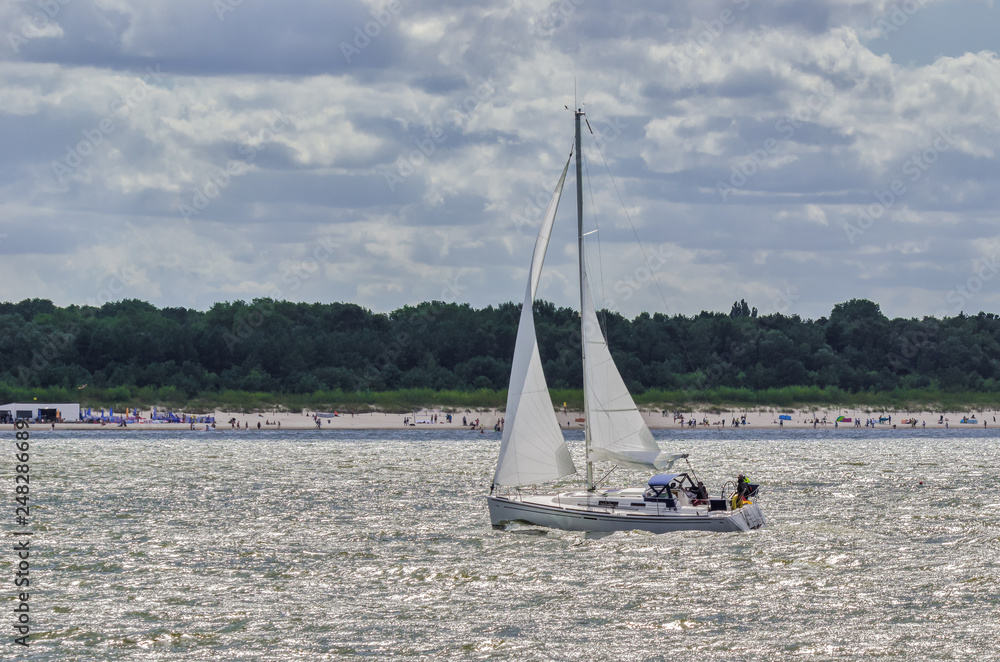 Obraz premium REST ON THE YACHT - Sailing along the coast