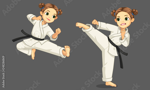 Cute little karate girl in karate pose