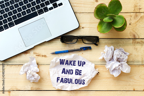 Wake Up And Be Fabulous, message onsmall paper on woodne table photo