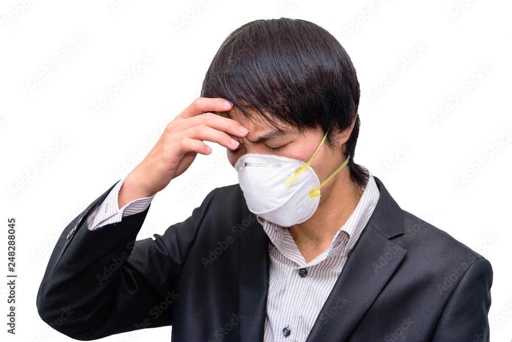 business man headache by pollution air / wear Hygienic mask and headache business man headache by pollution air / wear Hygienic mask and headache
