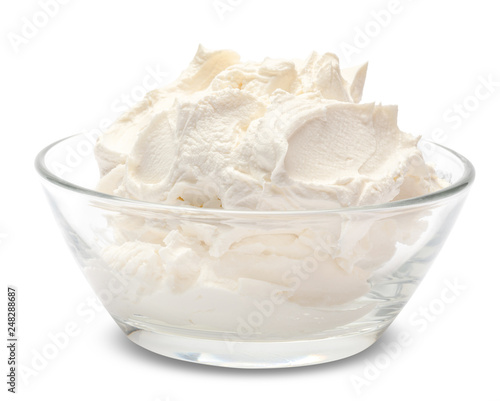 Traditional Mascarpone cheese in glass bowl isolated on white with clipping path