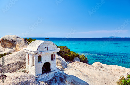 Rocky coast and turquoise sea in Greece photo