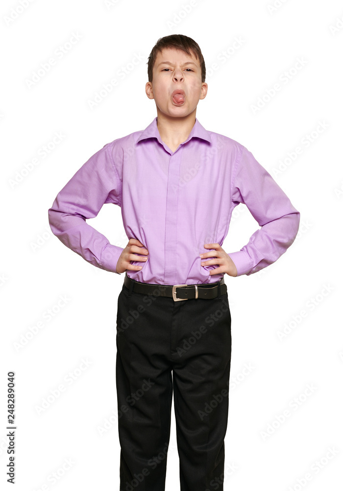 Boy posing on white background, black trousers and purple shirt Boy posing on white background, black trousers and purple shirt