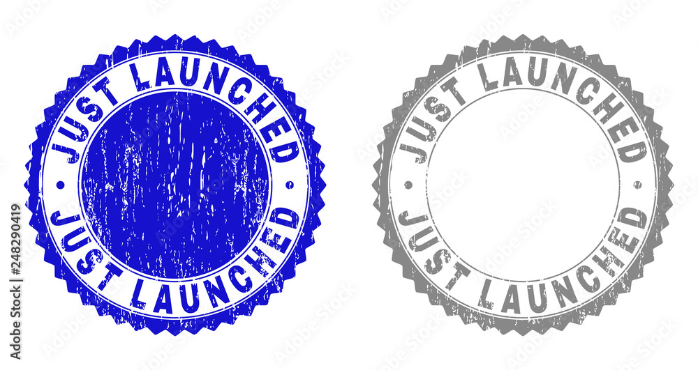 Grunge JUST LAUNCHED stamp seals isolated on a white background. Rosette seals with grunge texture in blue and grey colors. Vector rubber stamp imitation of JUST LAUNCHED text inside round rosette. Grunge JUST LAUNCHED stamp seals isolated on a white background. Rosette seals with grunge texture in blue and grey colors. Vector rubber stamp imitation of JUST LAUNCHED text inside round rosette.