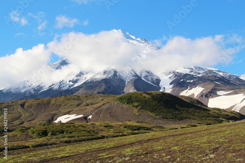 View of the Koryaksky volcano on a sunny day. Koryaksky or Koryakskaya Sopka is an active volcano on the Kamchatka Peninsula in the Russian Far East.