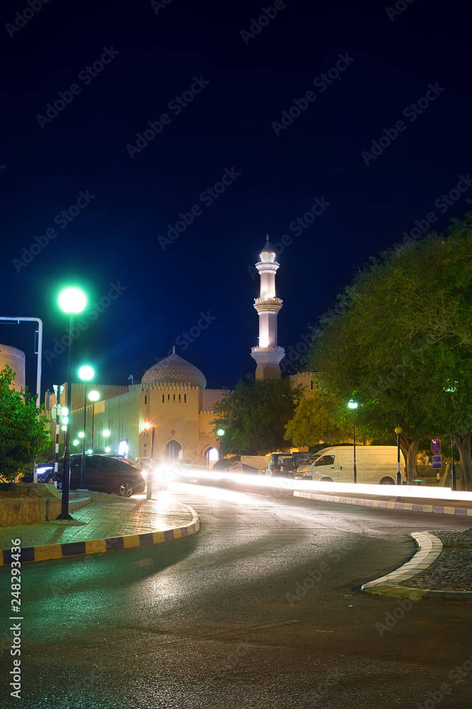 Night view at the old Nizwa Mosque illuminated at night (Oman)