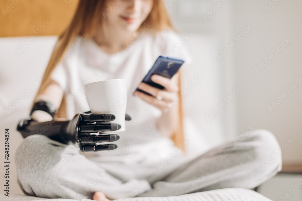 Photos prosthetic arm controlled by brain, blurred background, development, progress in