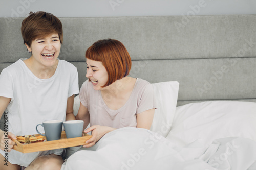 two crazzy awesome girls having fun during breakfast, close up photo. positive emotion, copy space photo