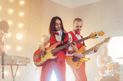 two ambitious people taking part in a musical conest. close up photo.the world of wonderful music, musical skills. photo