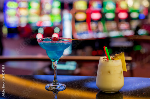 Blue cocktail and milkshakes are on the casino bar. Popular alcohol cocktails.