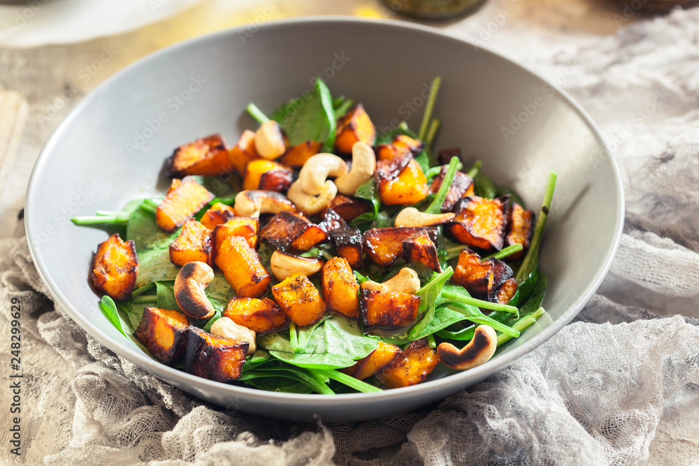 Roasted pumpkin salad with spinach and nuts Roasted pumpkin salad with spinach and nuts