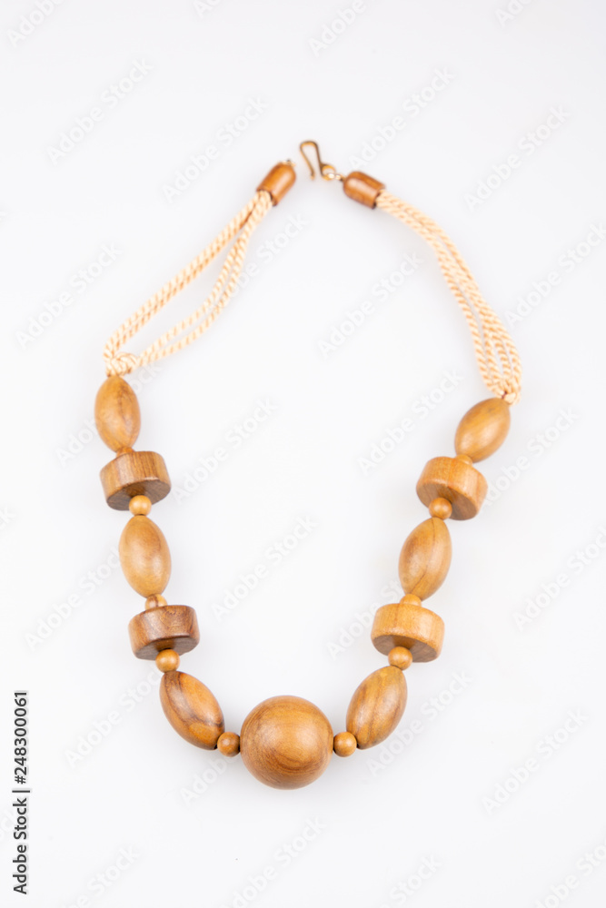 wood brown necklace fashion on white background wood brown necklace fashion on white background