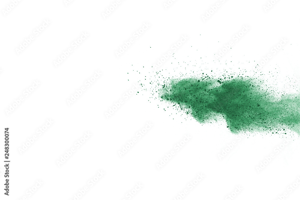 Green powder explosion on white background. Colored cloud. Colorful dust explode. Paint Holi.