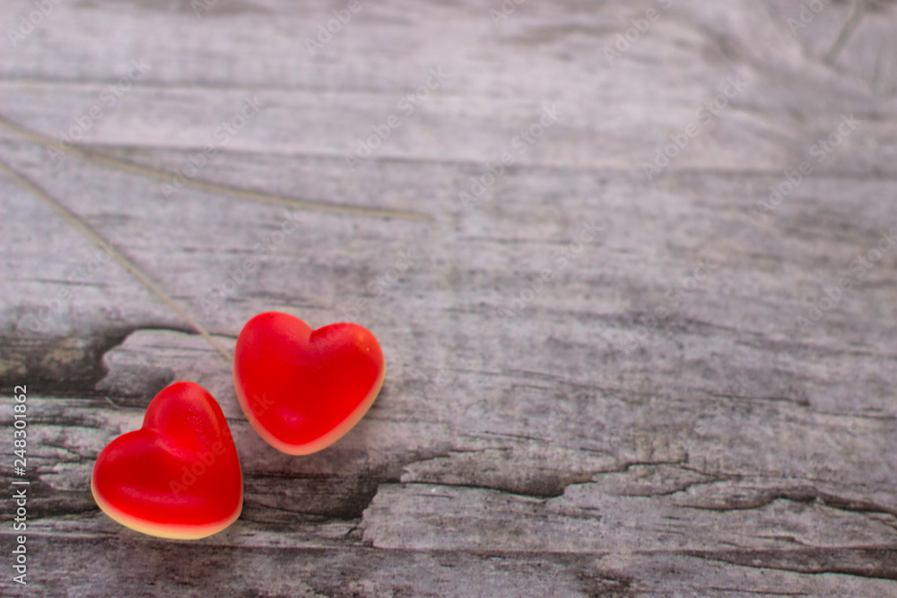 Obraz premium Jelly hearts on the wooden background. Valentine Day Concept.