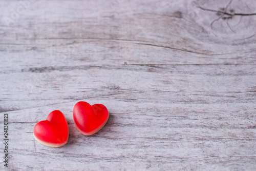 Jelly hearts on the wooden background. Valentine Day Concept.