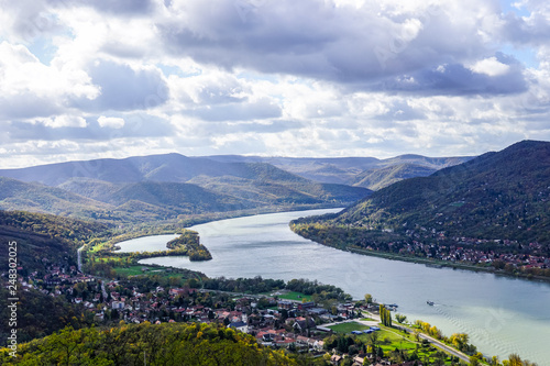 Aerial view of the Danube Band and hungarian city esztergom, slovakian city sturovo and danube river including spires of the saint ignac church