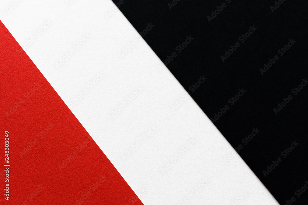 three-color contrast striped background of white black and red paper
