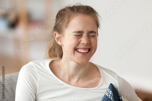 Bild auf Leinwand Happy joyful young girl laughing enjoying sincere positive emotions