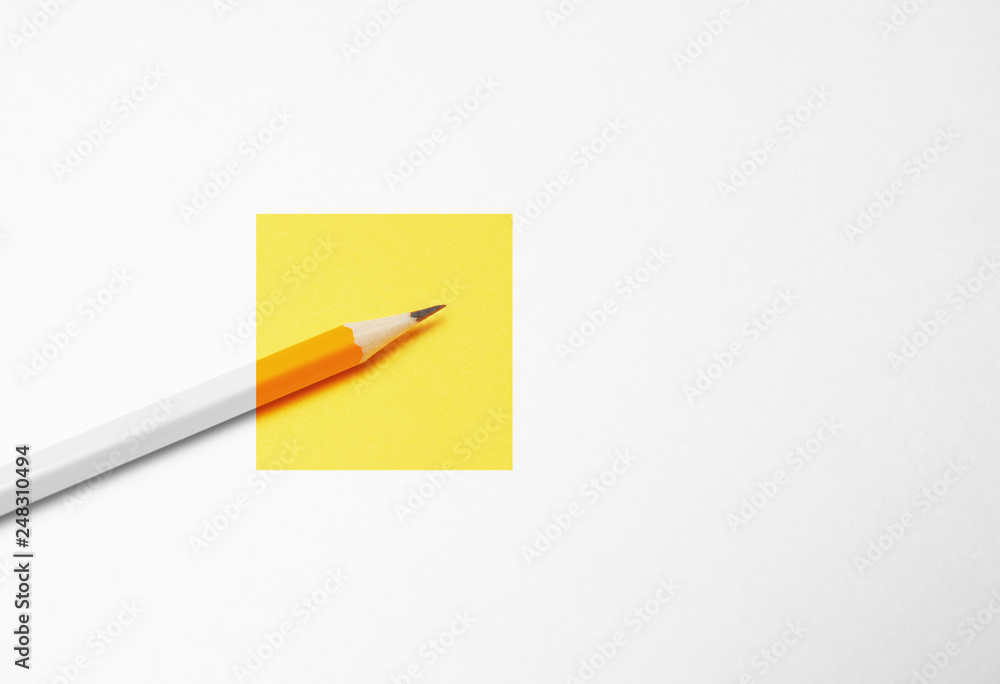 Yellow pencil on white background, minimalism. Creativity, idea, solution, creativity concept. Yellow pencil on white background, minimalism. Creativity, idea, solution, creativity concept.