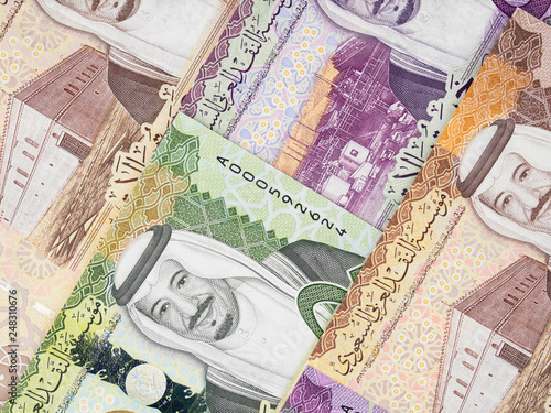 Saudi Arabia riyal (2016) background. Saudi Arabian money currency notes. Saudi Arabia economy.. photo